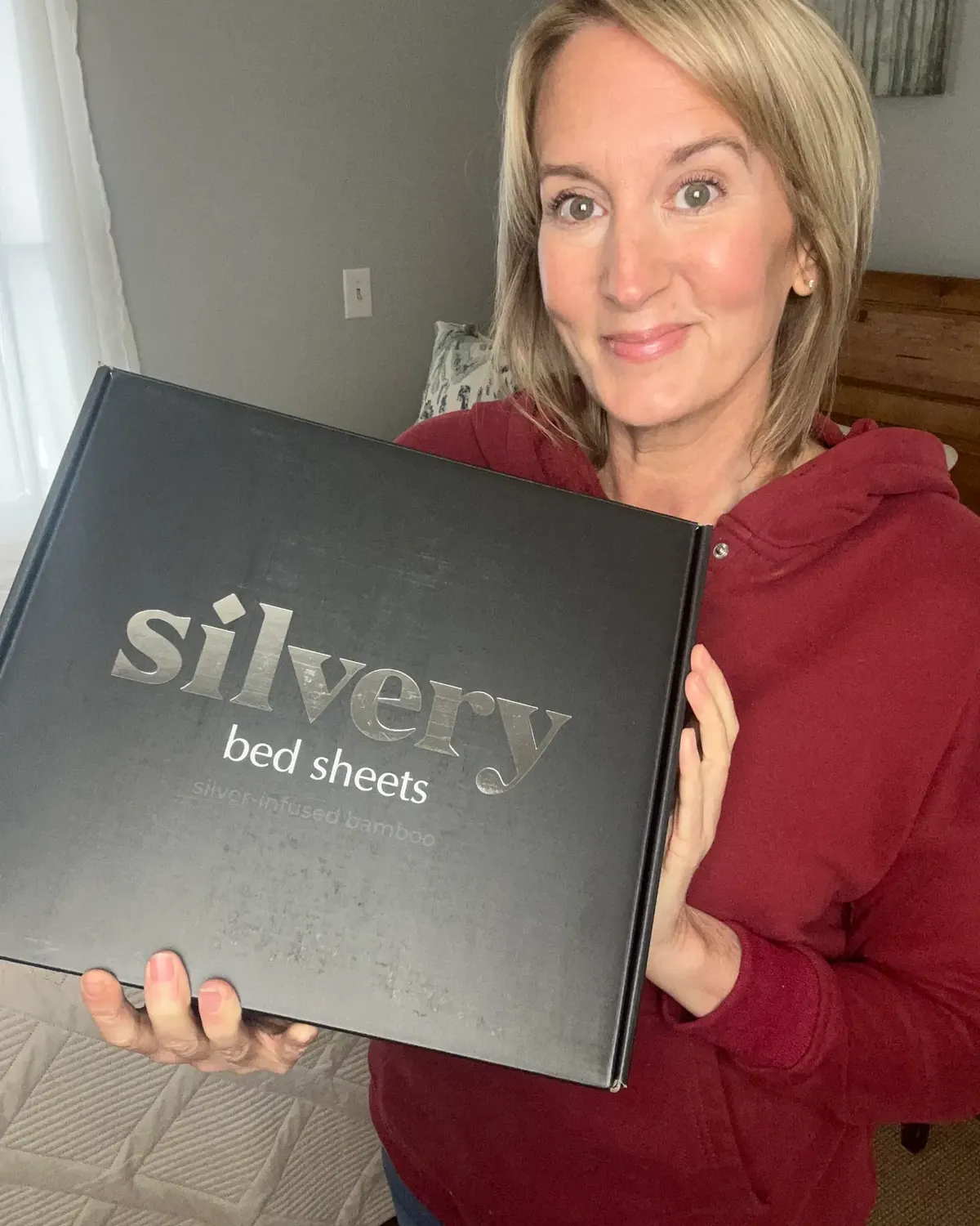 Silvery customer at home with their silver-infused bedding