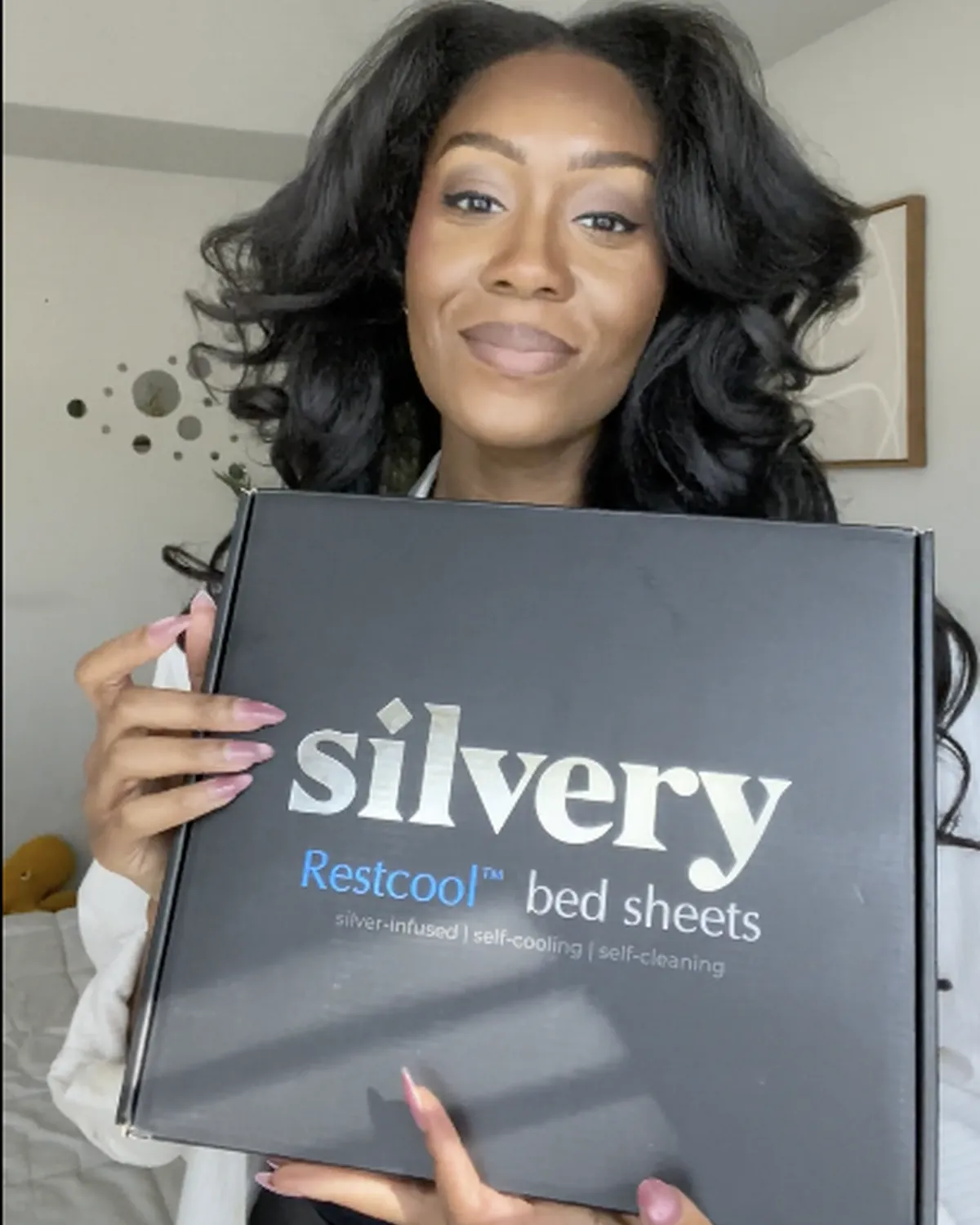 Silvery customer at home with their silver-infused bedding