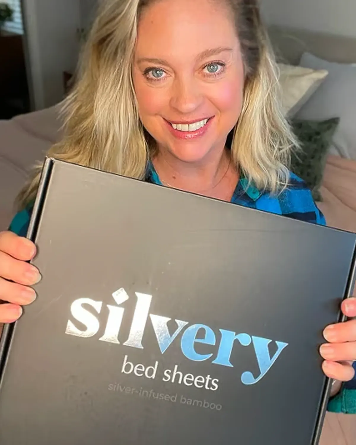 Silvery customer at home with their silver-infused bedding