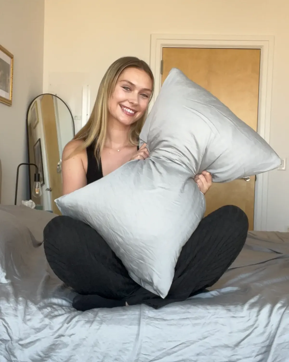 Silvery customer at home with their silver-infused bedding