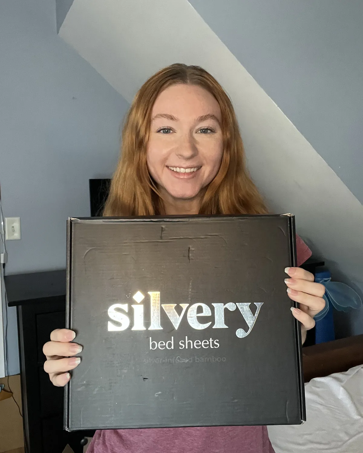 Silvery customer at home with their silver-infused bedding