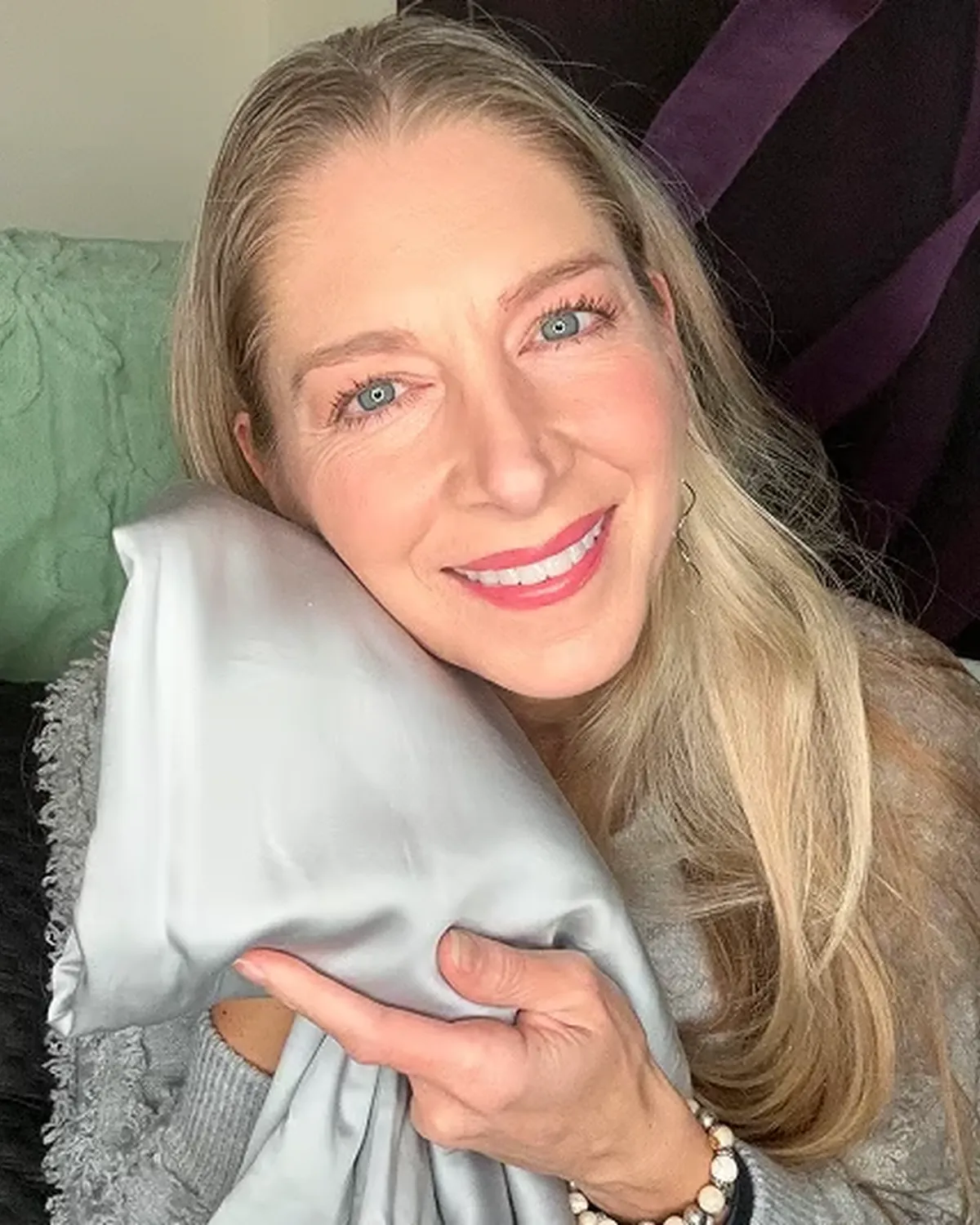 Silvery customer at home with their silver-infused bedding