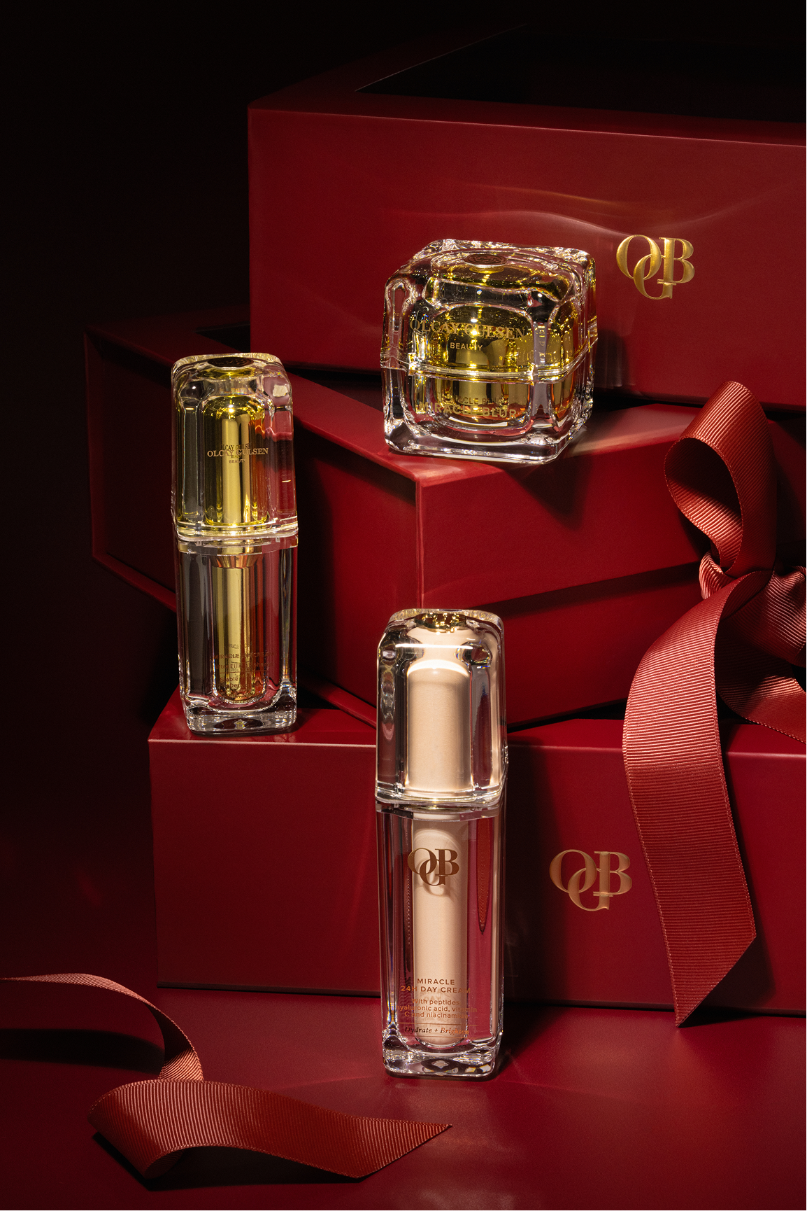 An OGB skincare gift set in a crimson gift box