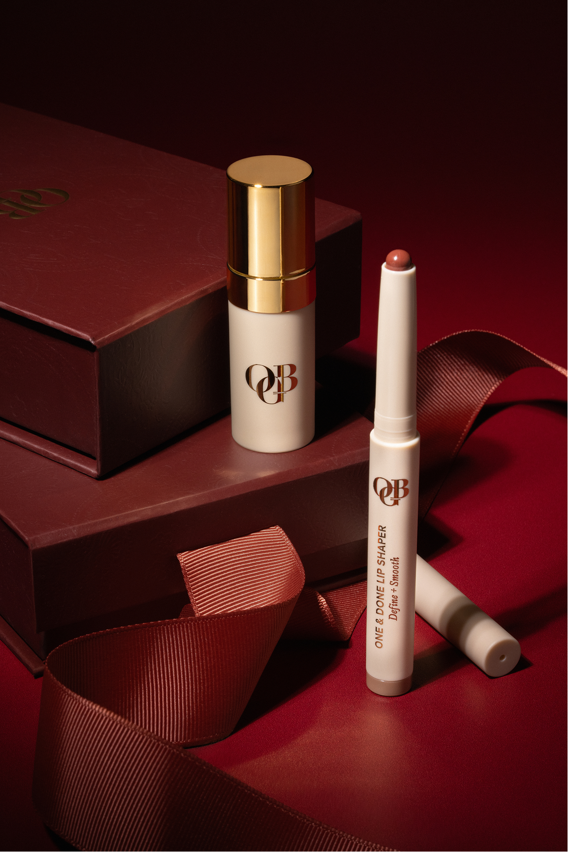 OGB lip gift set with a bronze satin ribbon