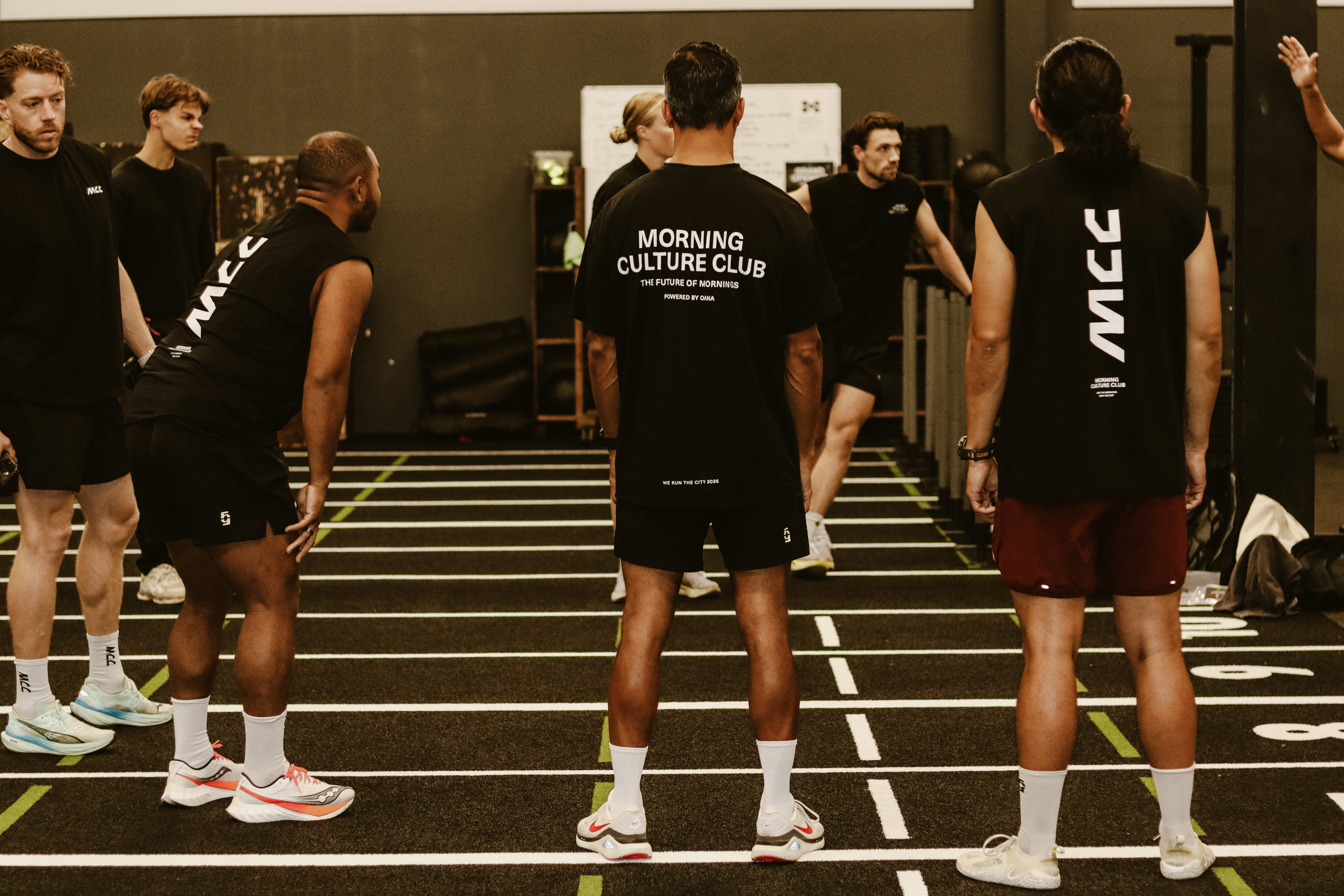 Morning Culture Club members lined up on a HYROX training floor