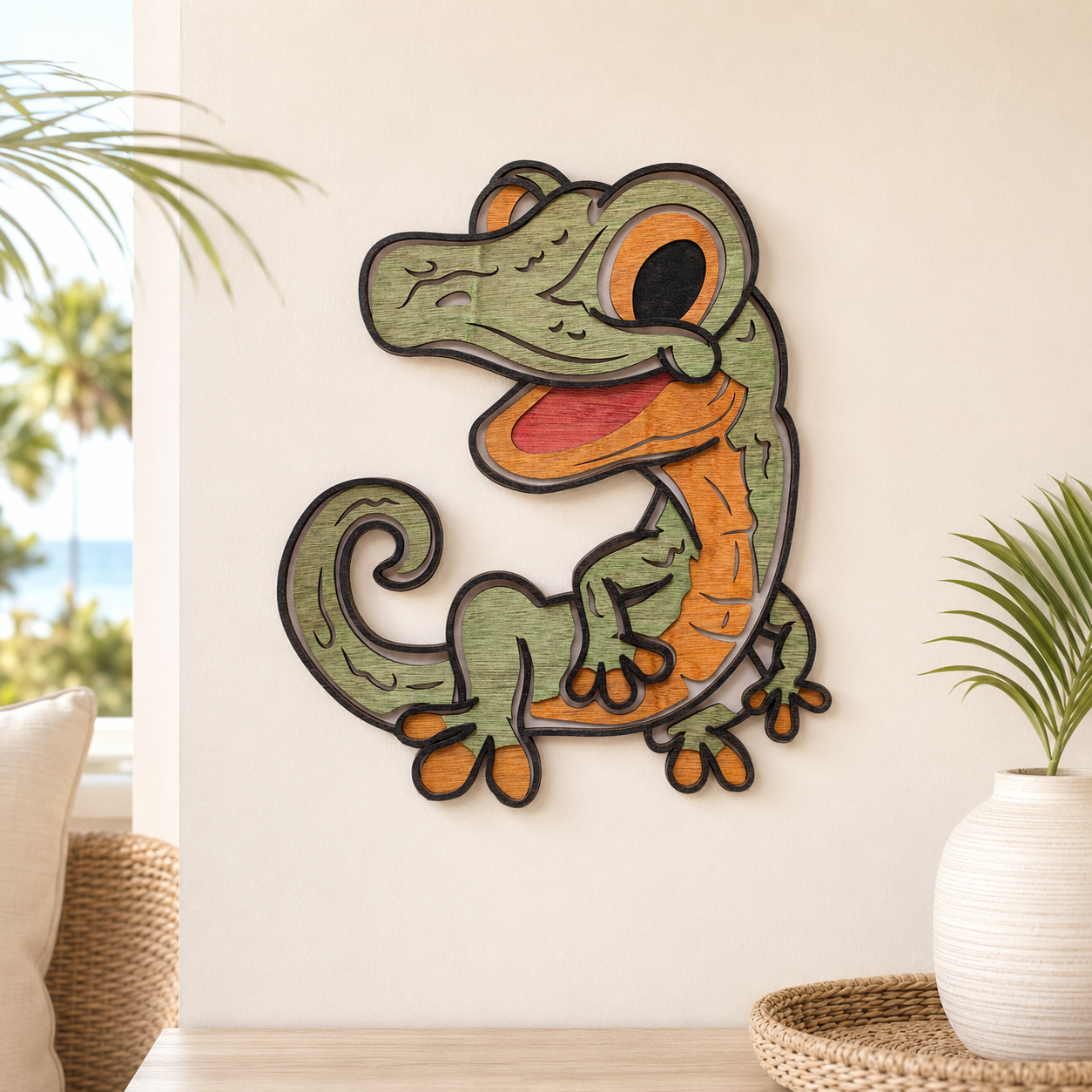 Colorful cartoon Gecko wall art in green and orange mounted on a white wall