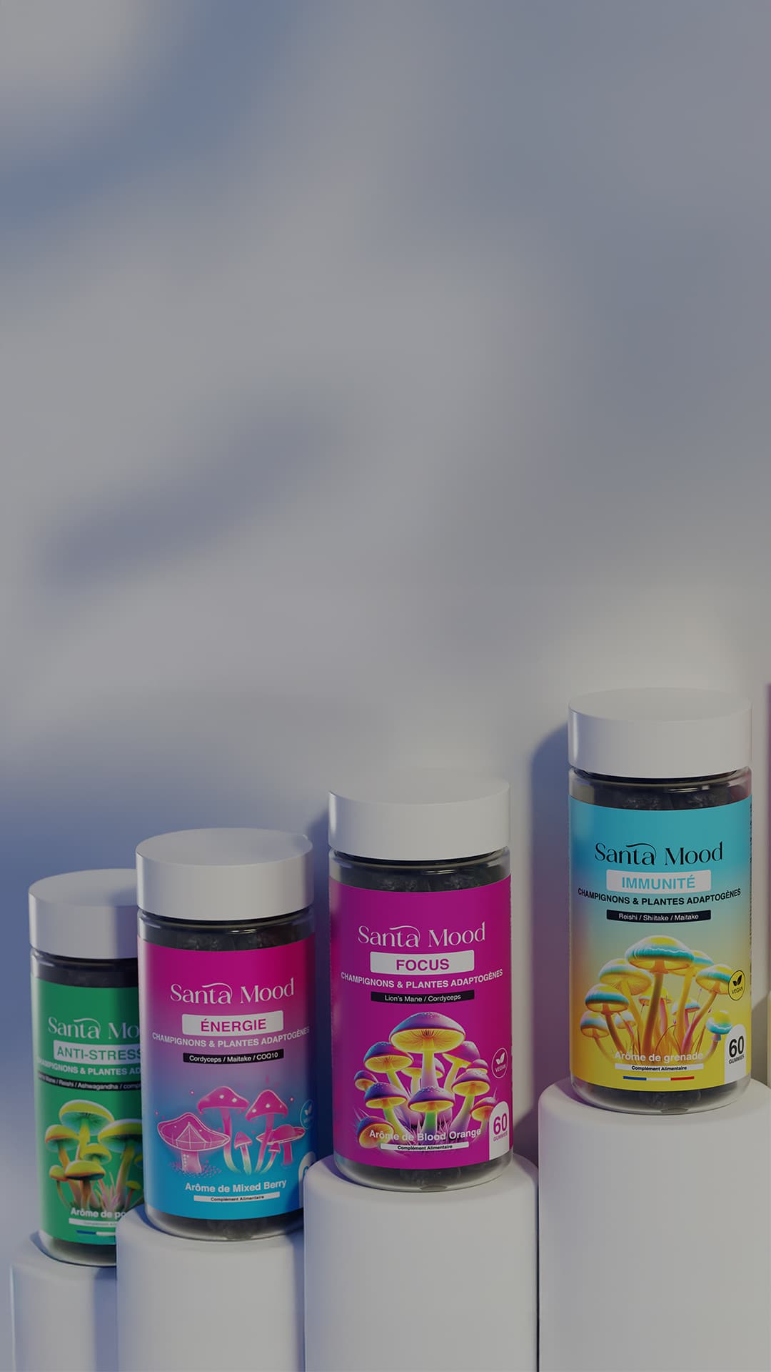 Six Santa Mood supplement jars with colorful labels on white pedestals against a soft background.