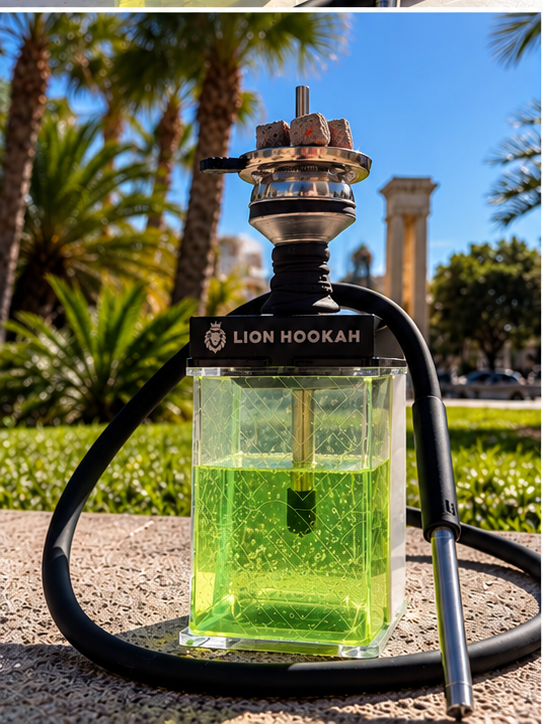 Lion Hookah Square with glowing lime-green base outdoors among palm trees on a sunny day