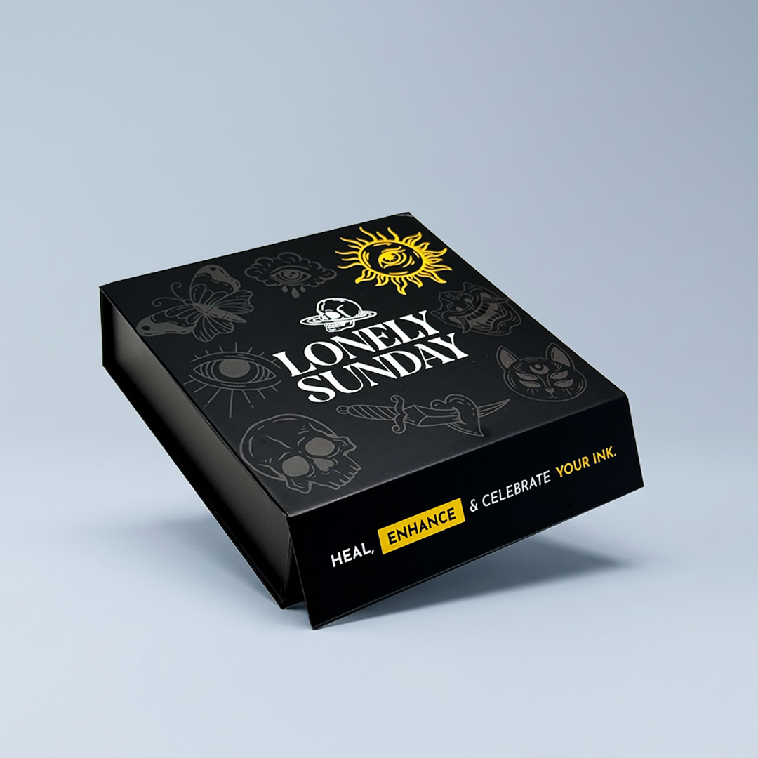 Close-up of a colourful floral tattoo moisturised with Tattoo Butter