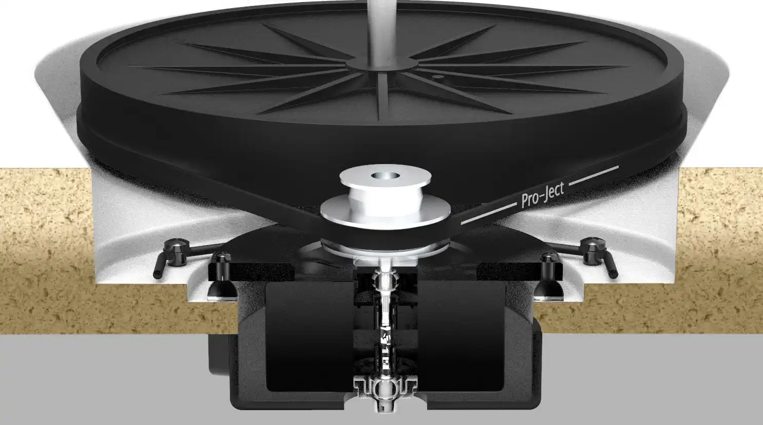 Cutaway view of a belt-drive turntable: an elastic belt looped around a silver motor pulley and the underside of the platter, with the bearing and motor mounted beneath the plinth