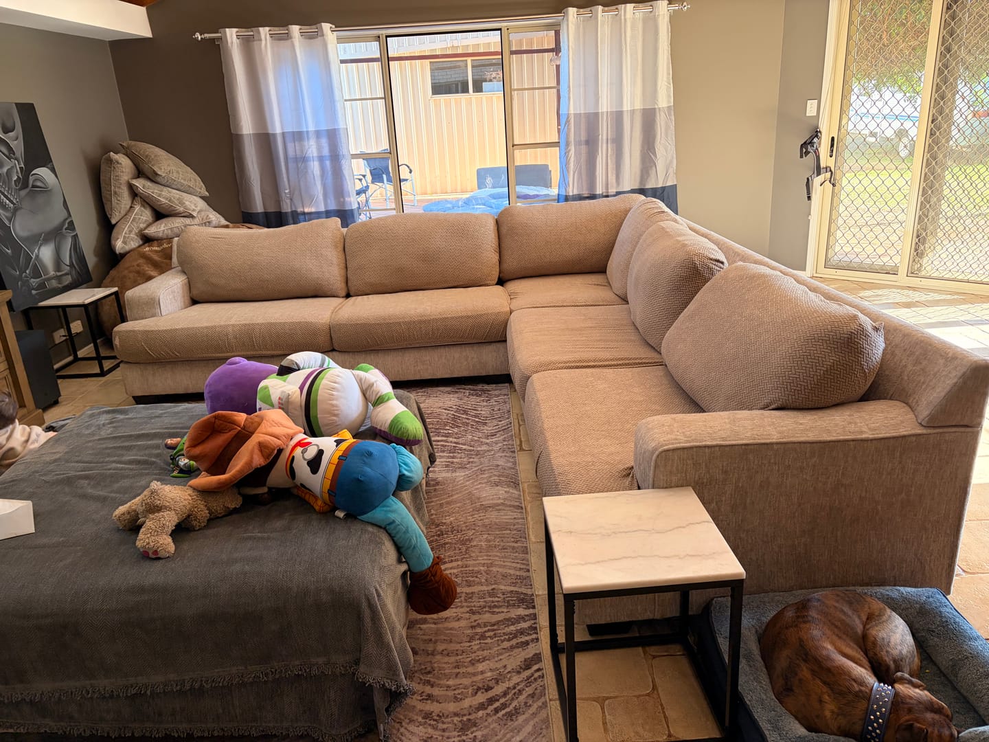 A customer’s couch with a CouchCoats cover, shared by @thenorthhome