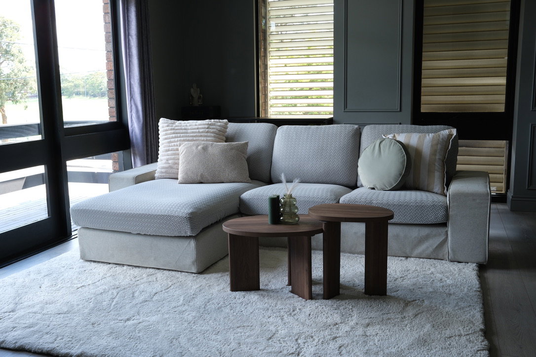 A customer’s couch with a CouchCoats cover, shared by @sharnz.lewis