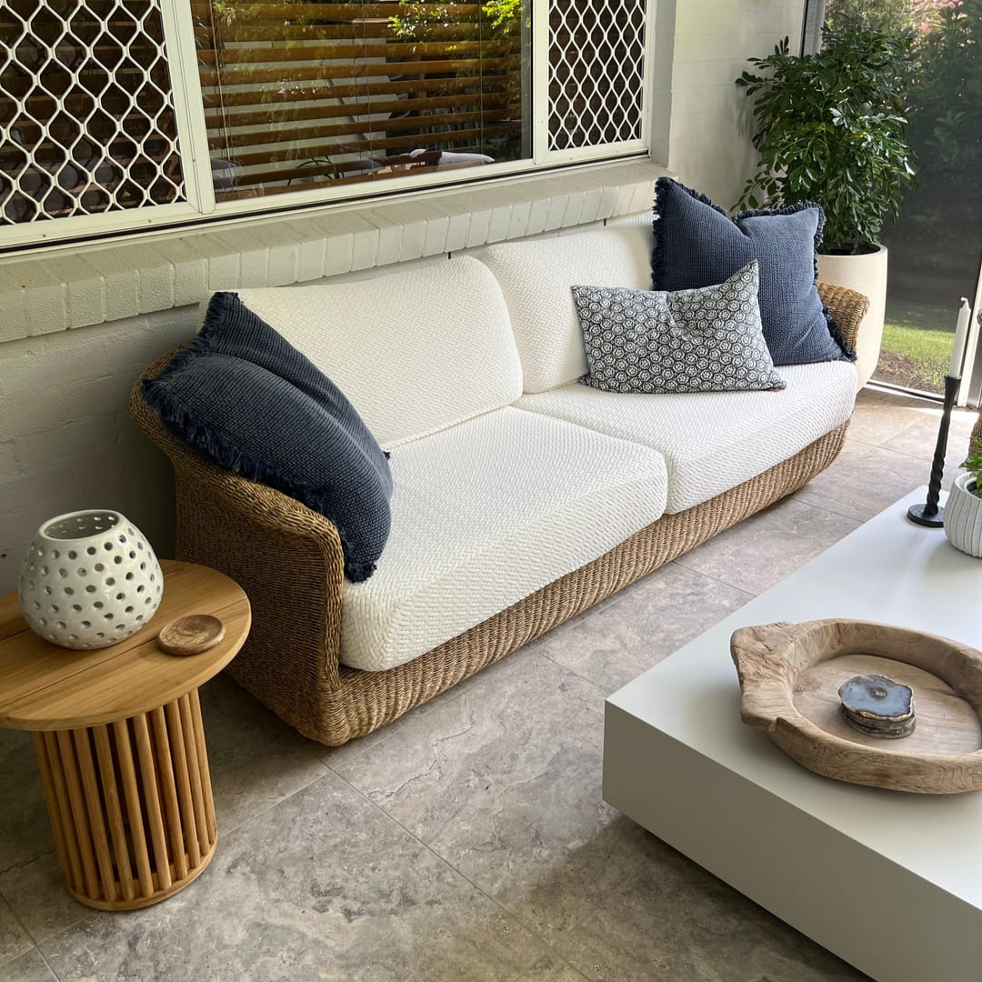 A customer’s couch with a CouchCoats cover, shared by @cooperskingdom