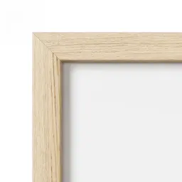 Close-up of the light oak frame corner showing the wood grain
