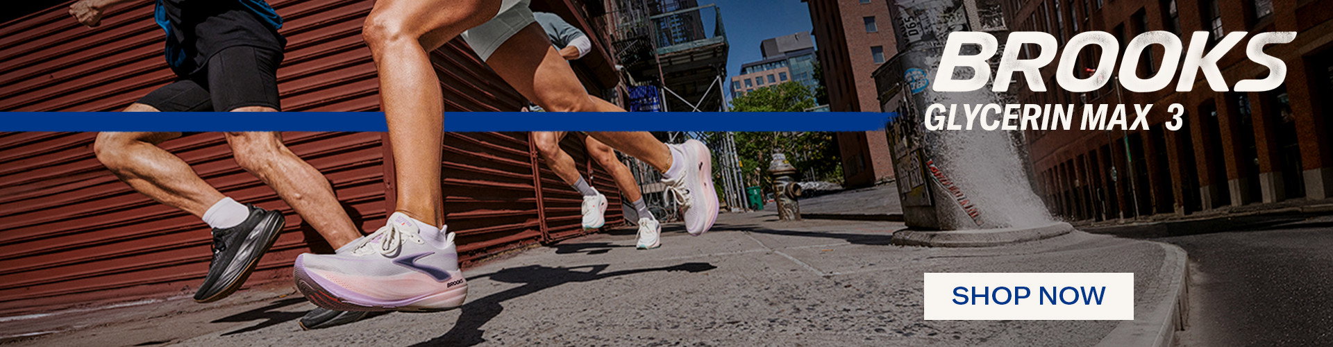 Runners in Brooks Glycerin Max 3 shoes striding along a city street