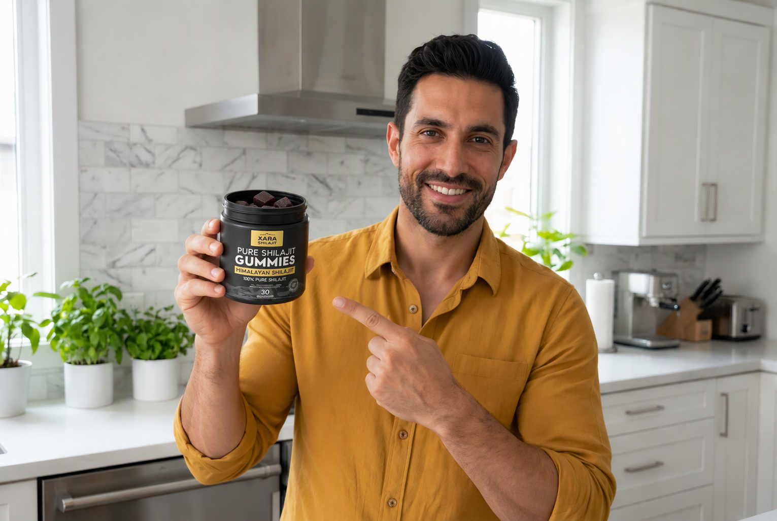 XARA customer holding an open jar of shilajit gummies in his kitchen