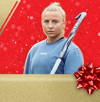 field hockey female athlete with stick and holiday imagery