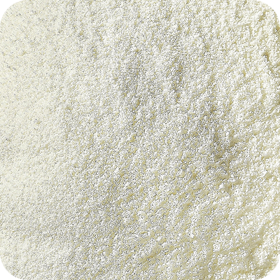 Close-up of fine, white granular collagen powder with a slightly textured surface.