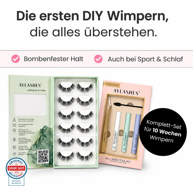AYLASHES Starter Kit: geöffnete grüne Wimpernbox mit sechs Wimpernpaaren und All I Need Tool Kit mit Applicator, Bürstchen, Bond, Top Coat und Remover