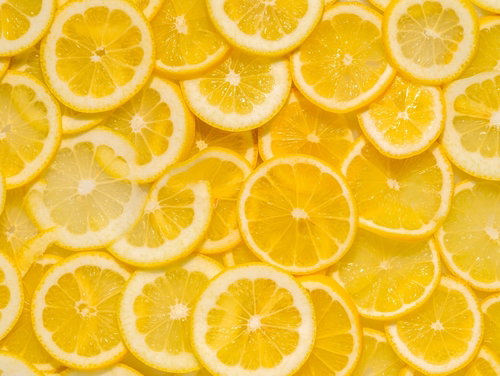 Fresh Sicilian lemons on a wooden board