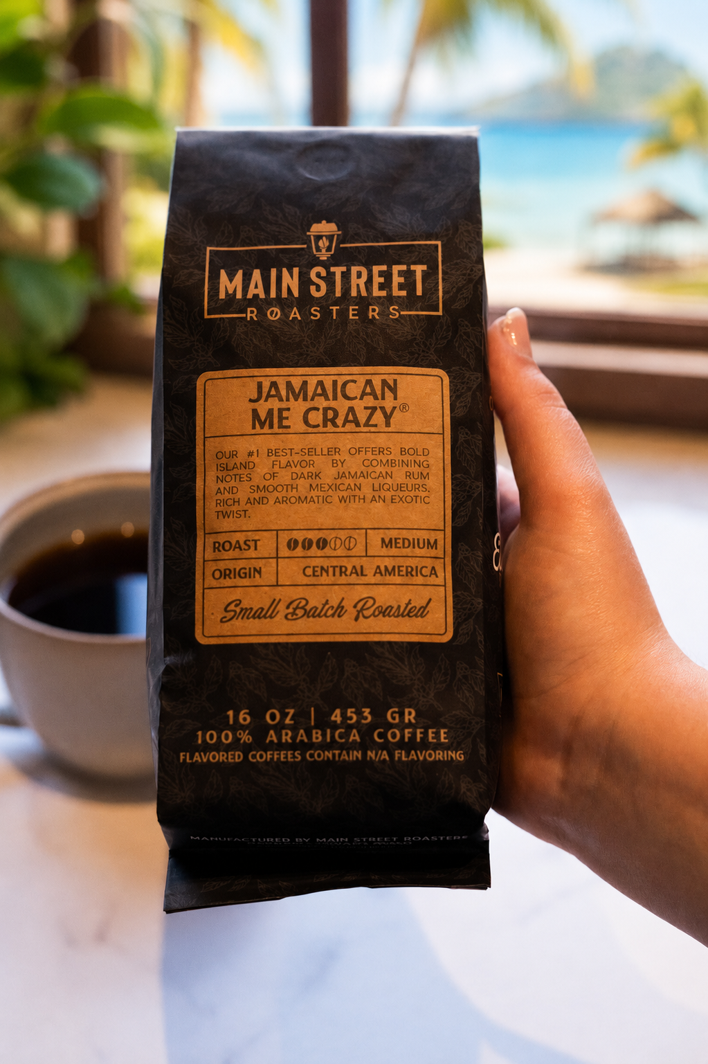 A bag of Jamaican Me Crazy coffee beside a steaming mug on a sunlit kitchen counter