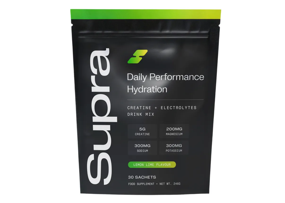 Black and green Supra Daily Performance Hydration drink mix pouch, lemon lime flavor.