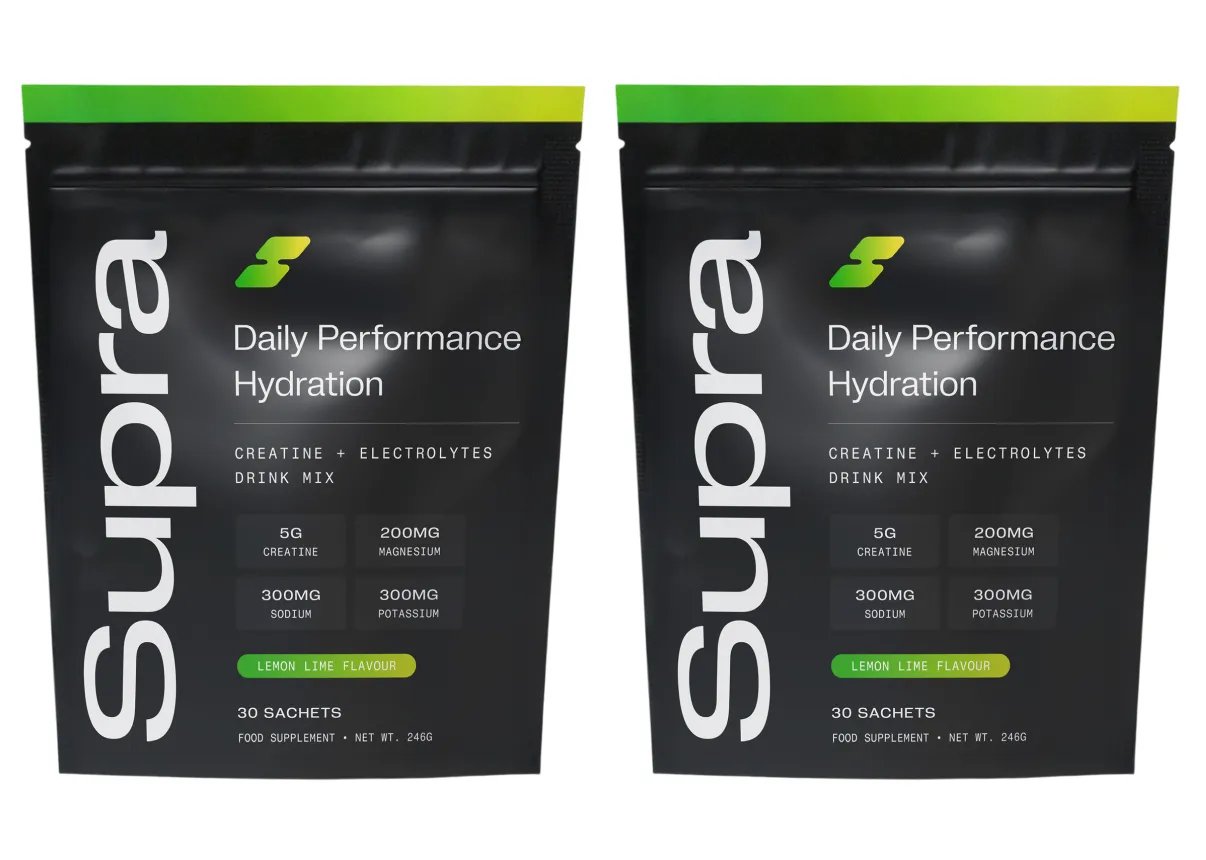 Two black pouches of Supra Daily Performance Hydration creatine and electrolytes lemon lime drink mix.