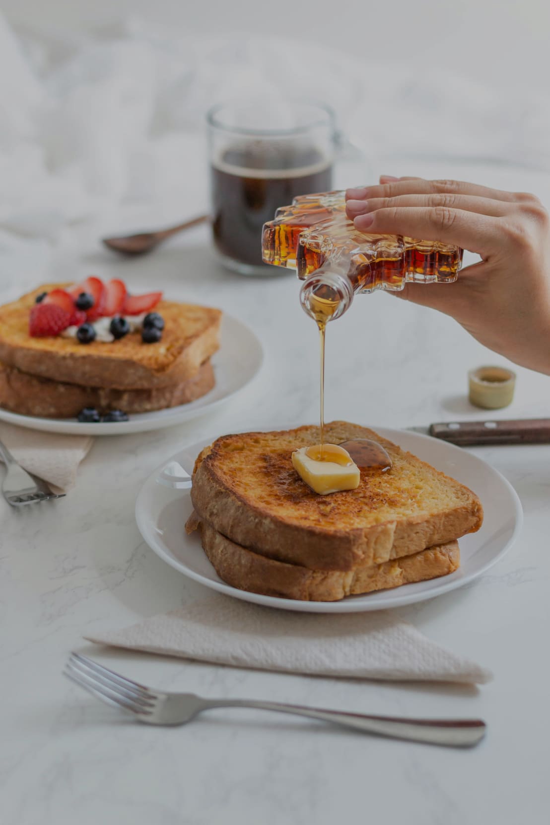 Maple Syrup being poured onto french toast