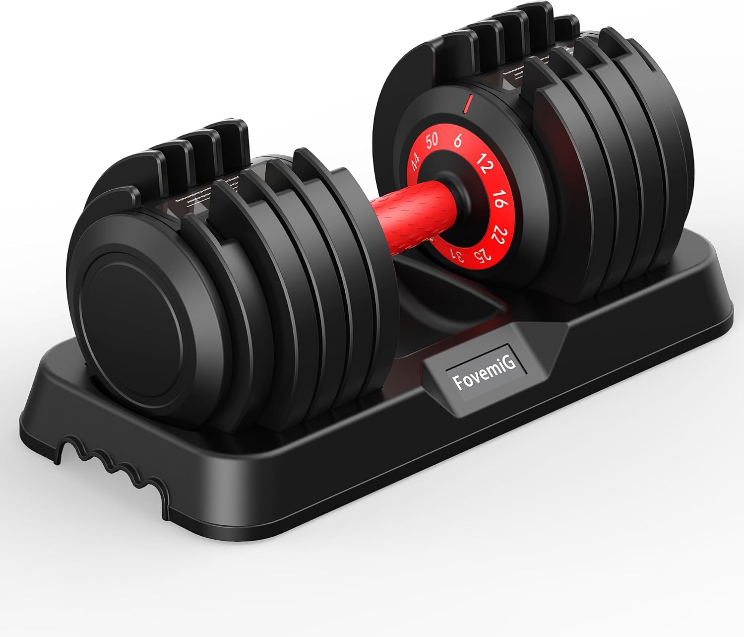 Hand setting a FitLife adjustable dumbbell down into its storage tray