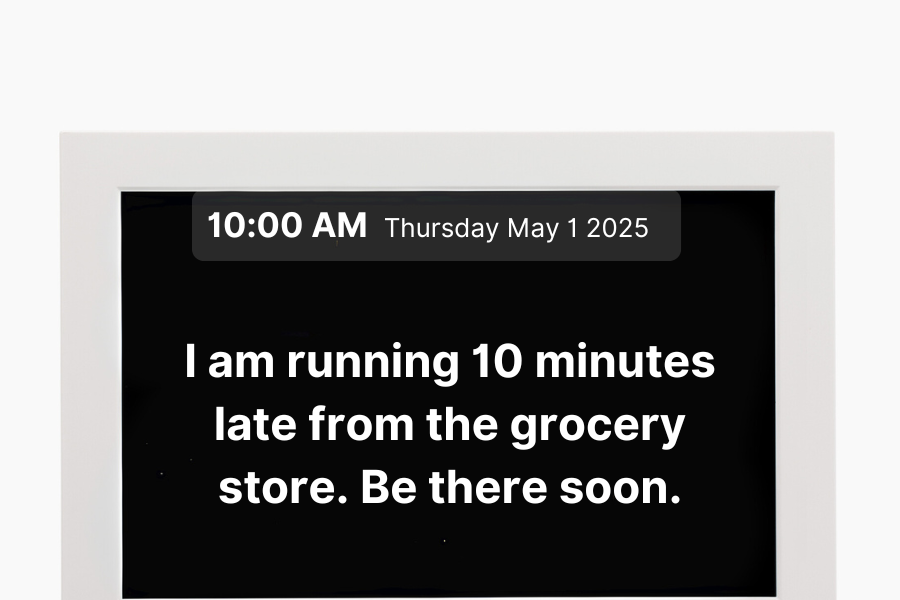 Memoryboard digital screen with time and date. Message: &quot;I am running 10 minutes late from the grocery store.&quot;