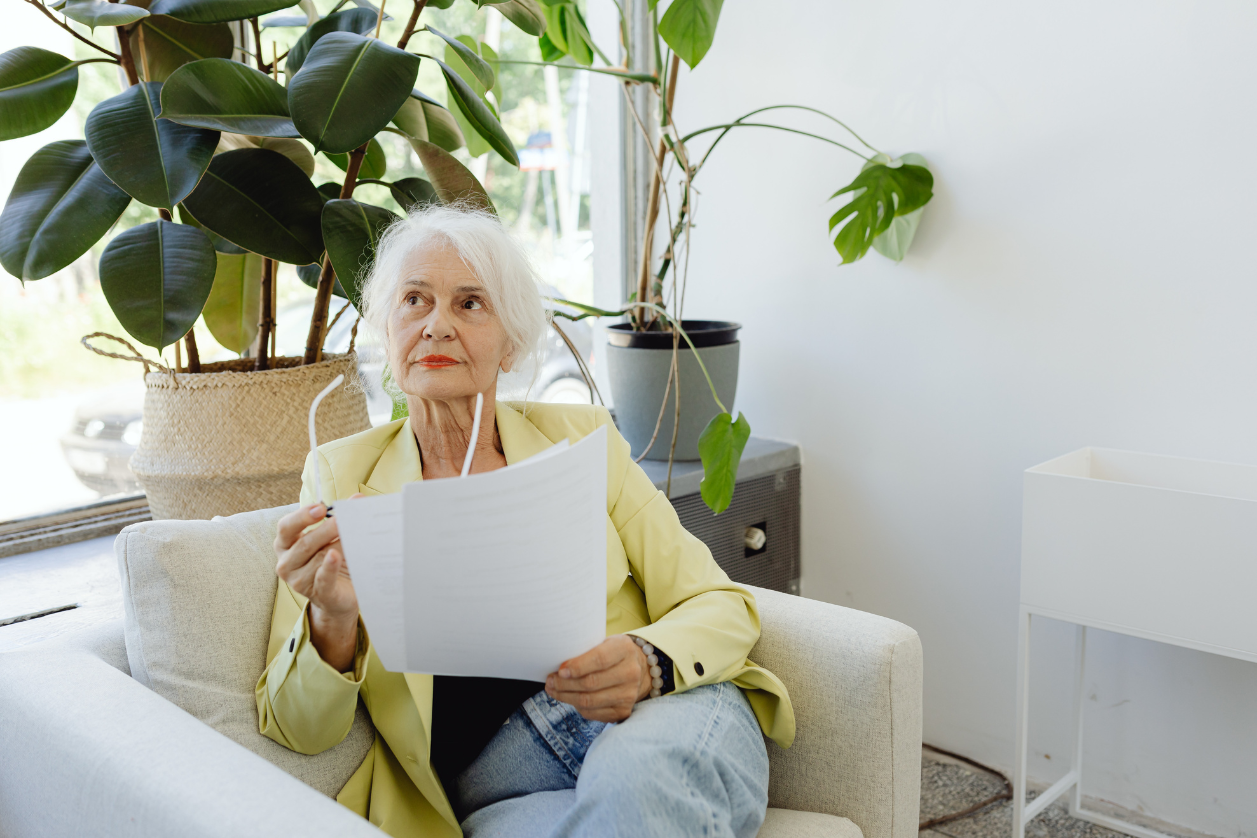 Dementia patient looking at a white board with reminders