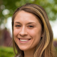 Headshot of a customer giving a positive review about Memoryboard.