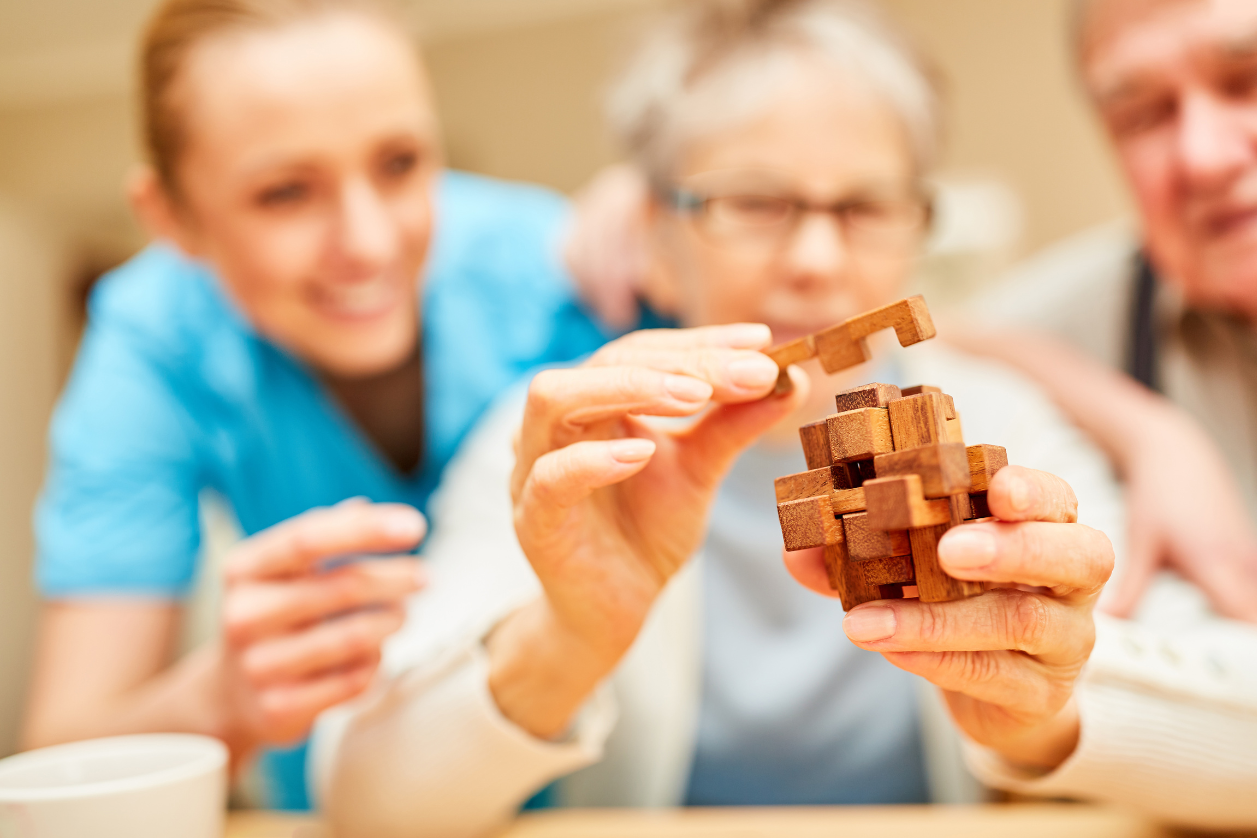 Staying connected with a loved one with memory loss by playing games and activities.