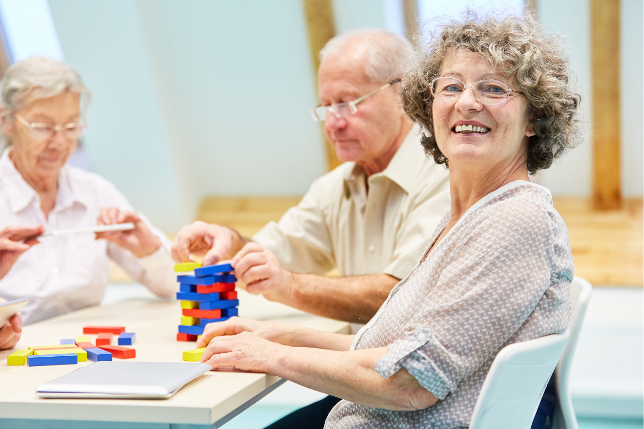 People with dementia doing an activity together.