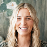 Headshot of a real Memoryboard customer giving a positive review of Memoryboard.