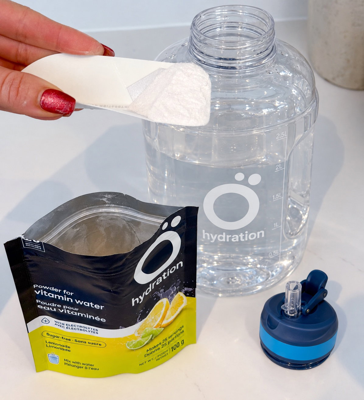 Une mesurette de préparation Ö ajoutée à la bouteille
