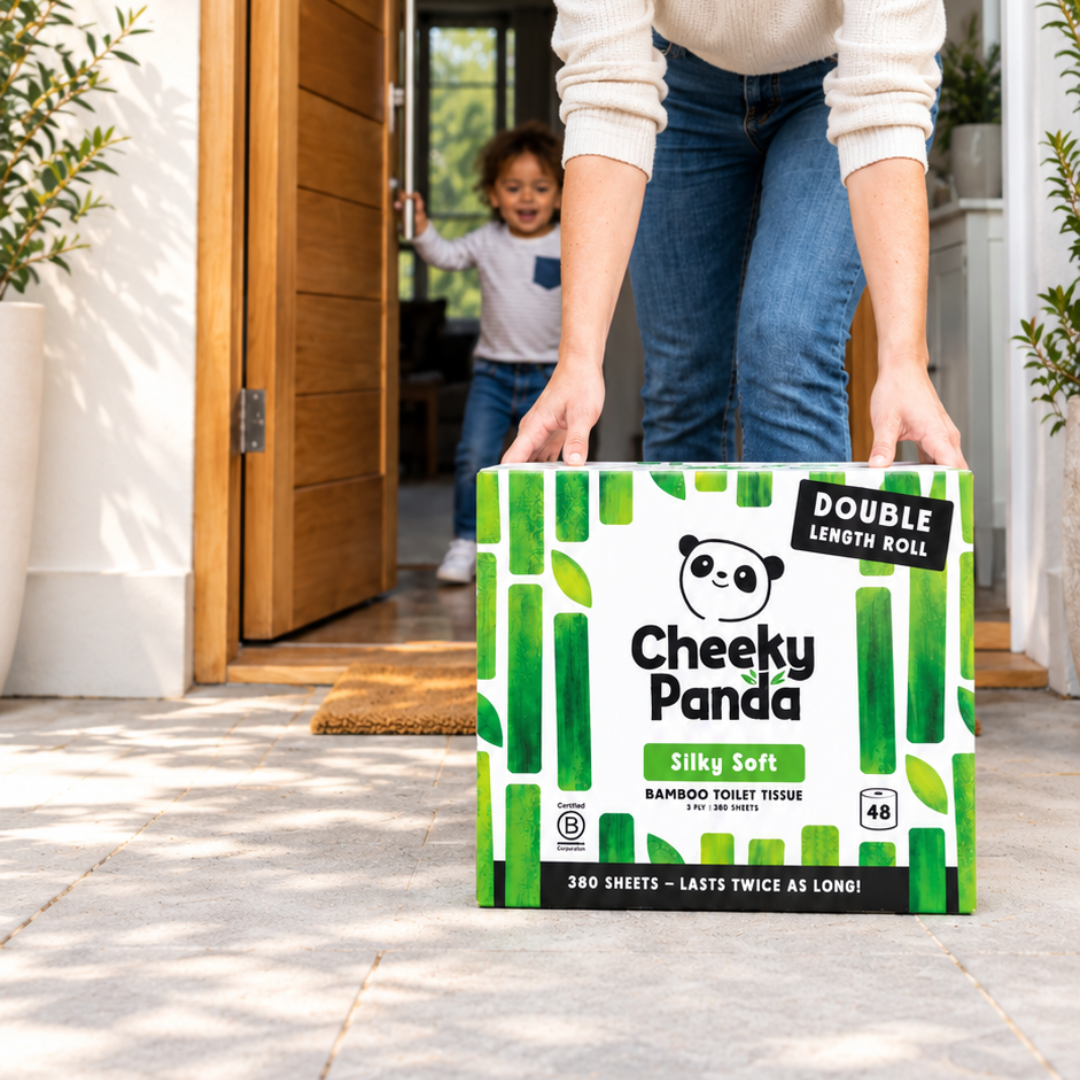 Open delivery box of Cheeky Panda Double Roll toilet tissue on a sunny doorstep