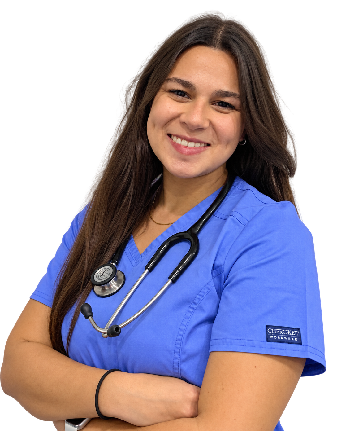 Veterinária da Pet City sorrindo, de braços cruzados e com estetoscópio