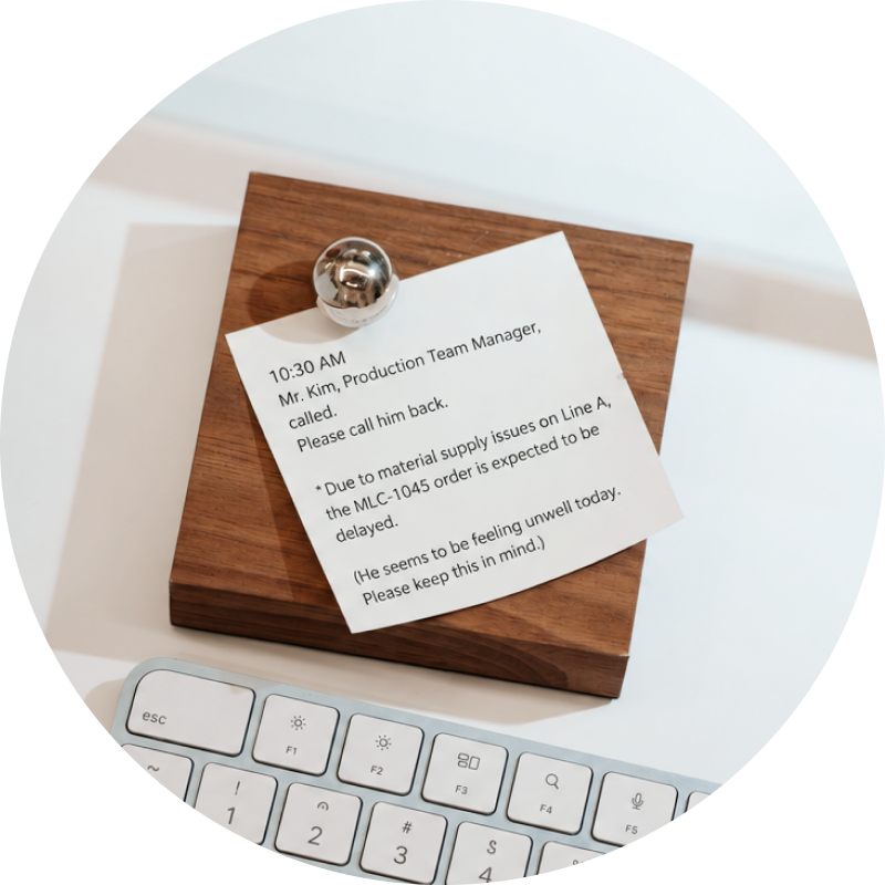 Printed sticky note on a desk
