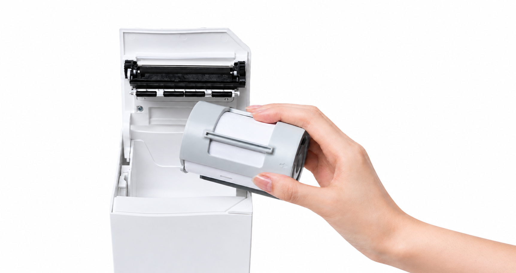 Hand loading a paper roll into an open nemonic printer