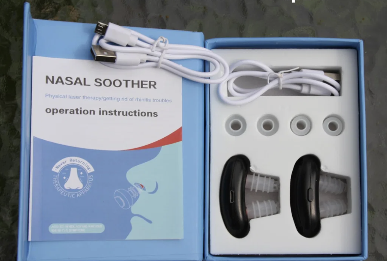 Open Fitora box with two devices, silicone tips, USB cable and instruction booklet