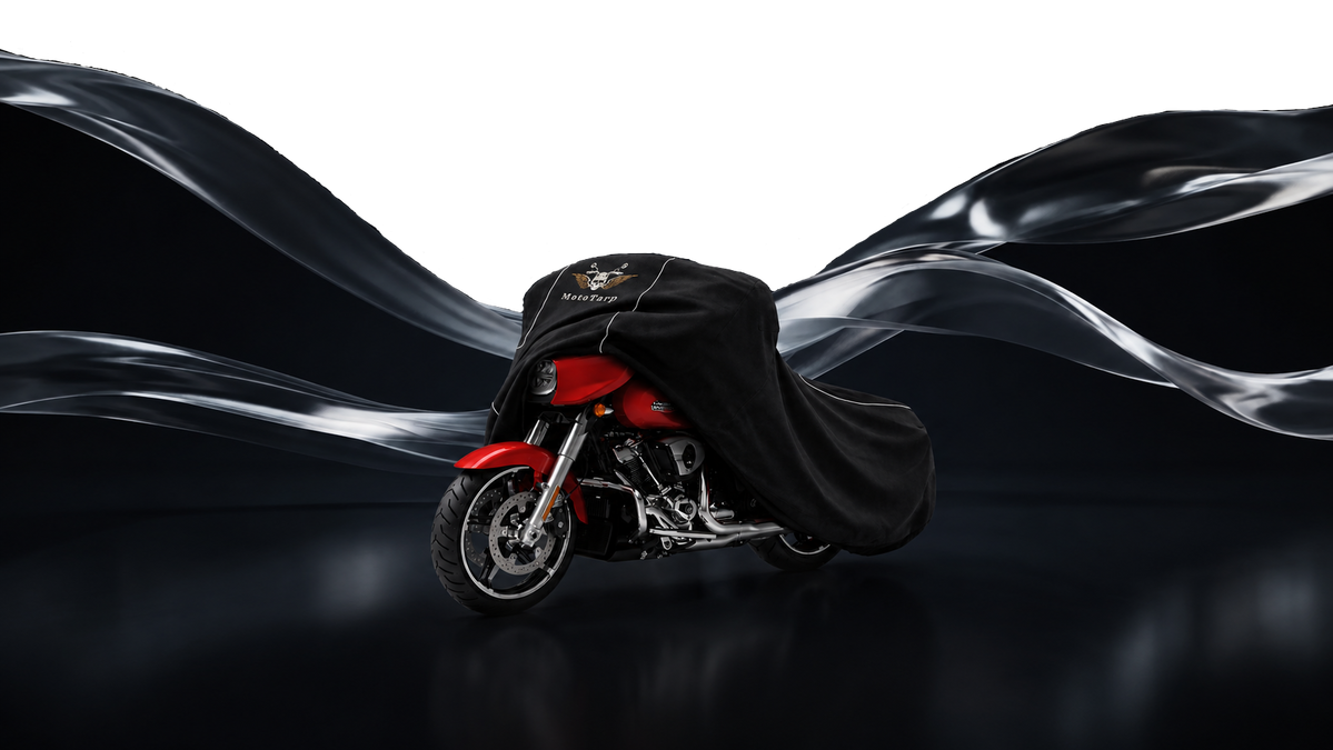 A MotoTarp cover being drawn over a motorcycle