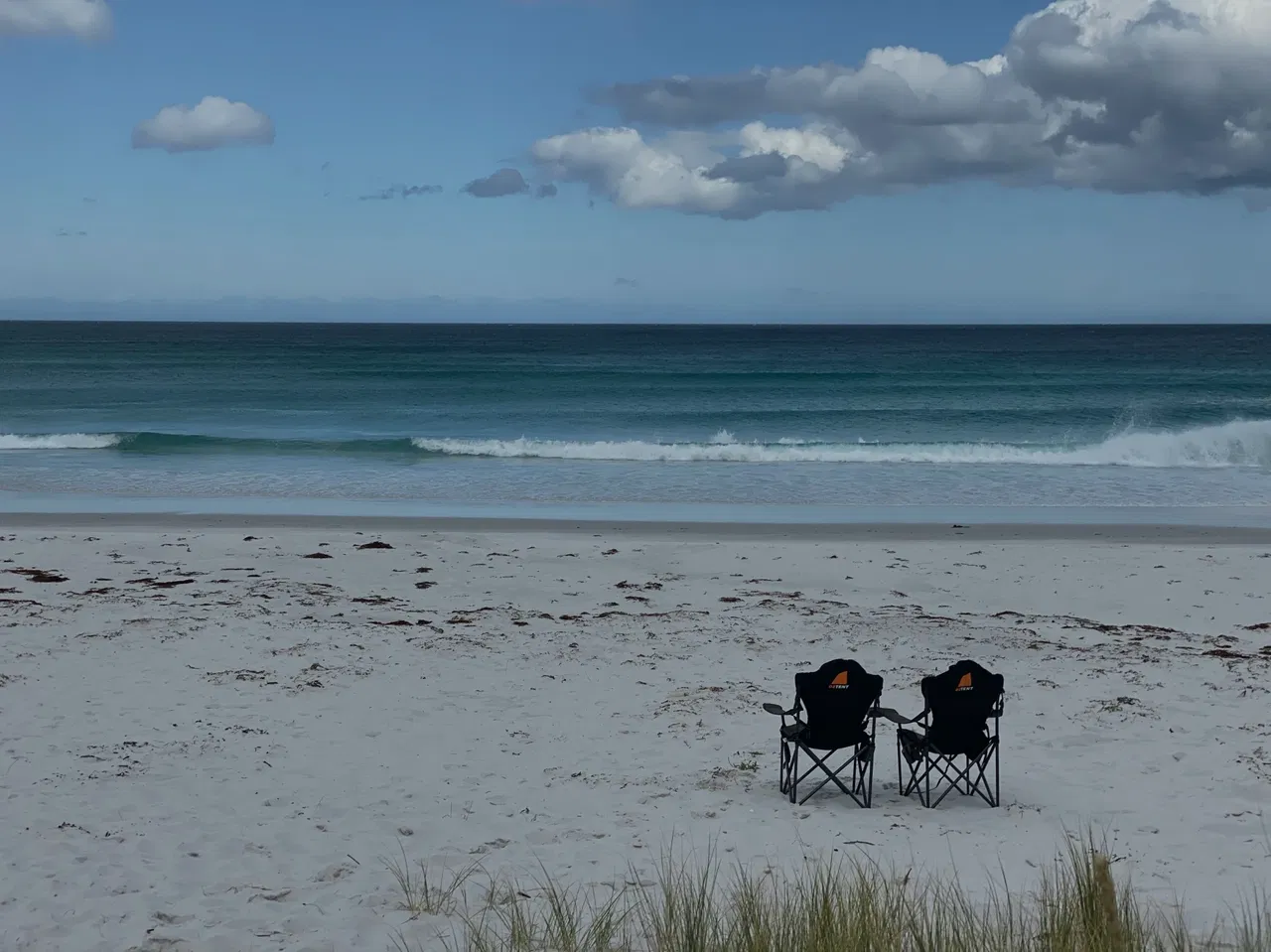 two darche camping chairs on beach