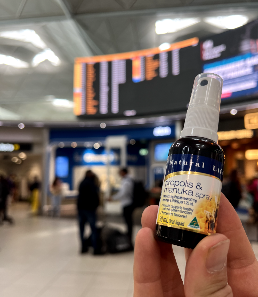 Propolis & Manuka Honey Spray tucked into a handbag, ready for the day