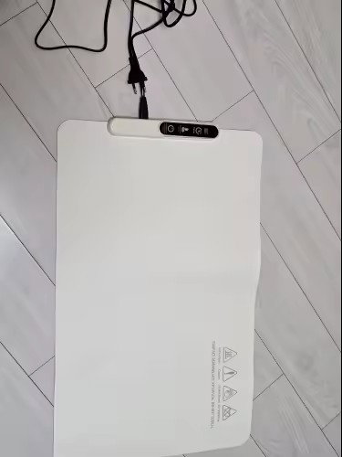 Photo de cliente : repas de famille servi sur le Warmio Mat