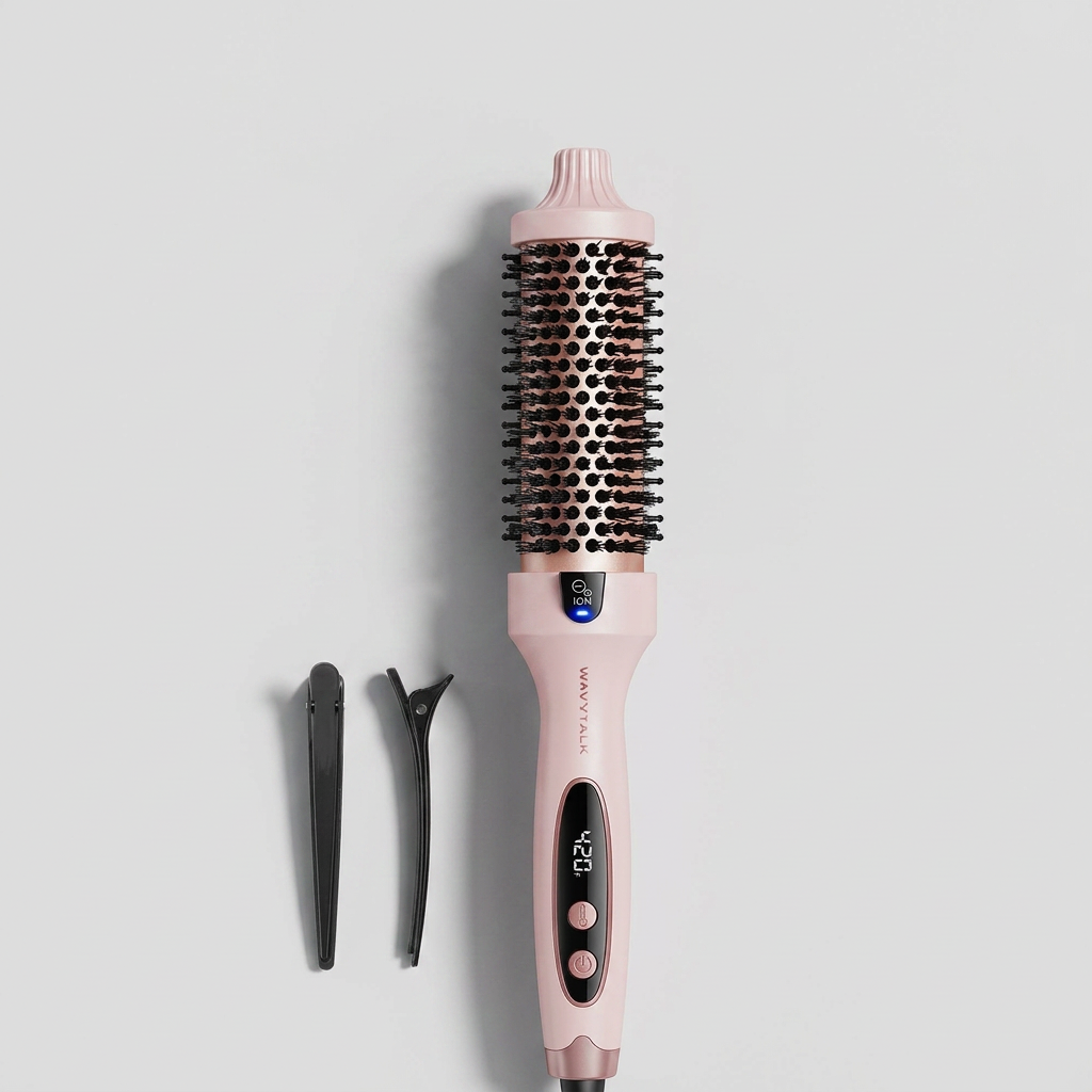 Pink round hair styling brush with digital display and two black hair clips on a white background