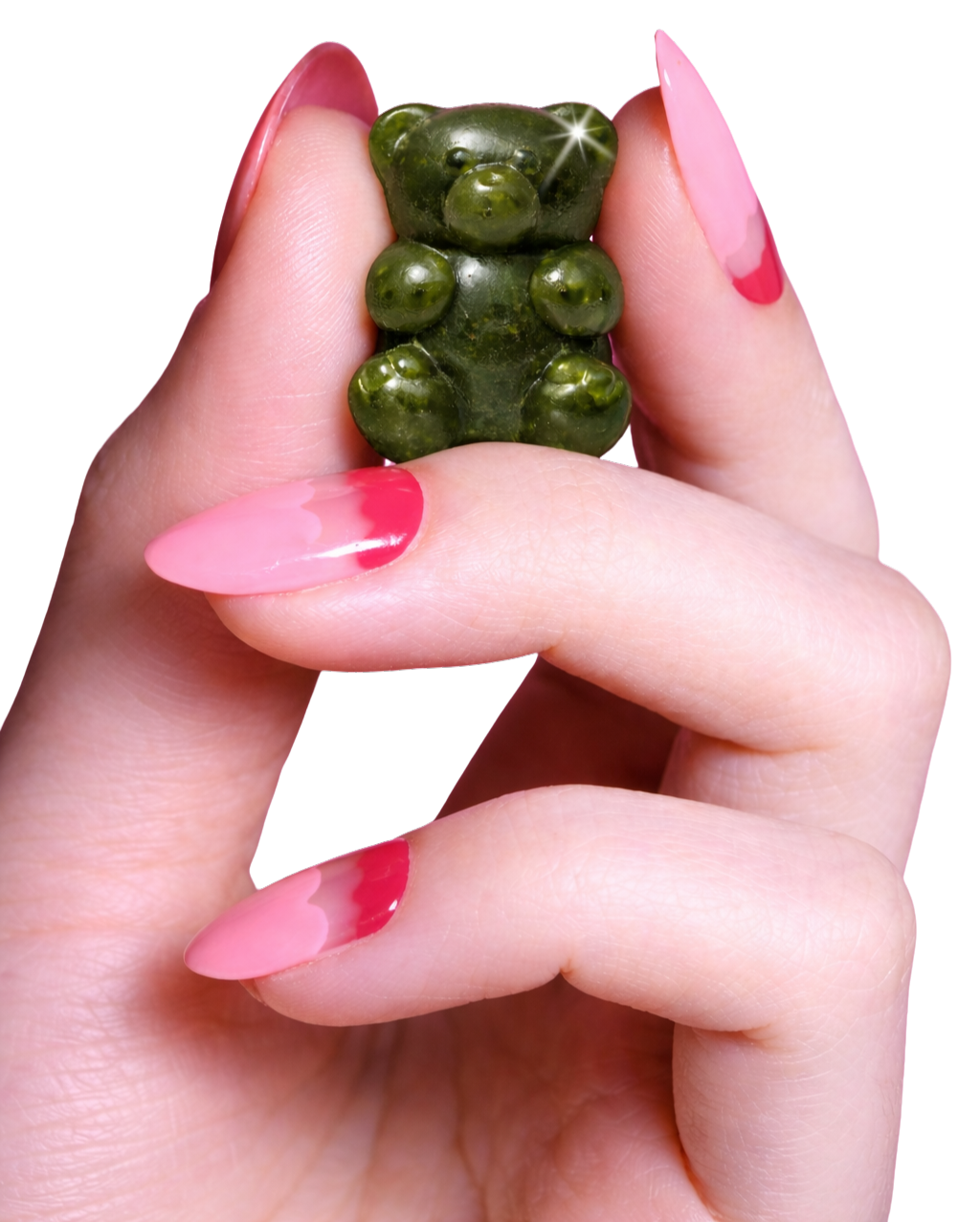 Hand with pink and red polished nails holding a small green gummy shaped like a teddy bear