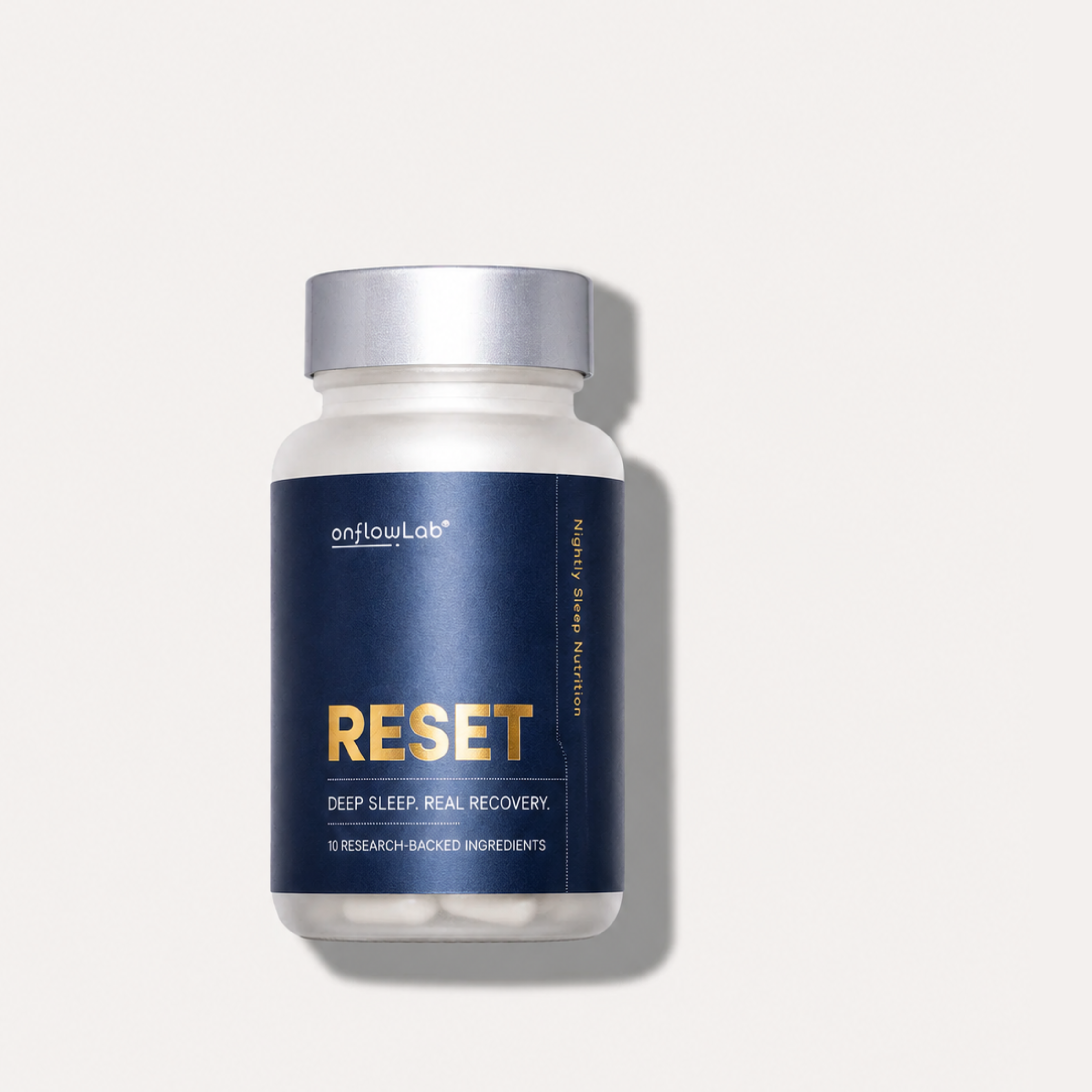 A bottle of RESET™ nightly sleep nutrition