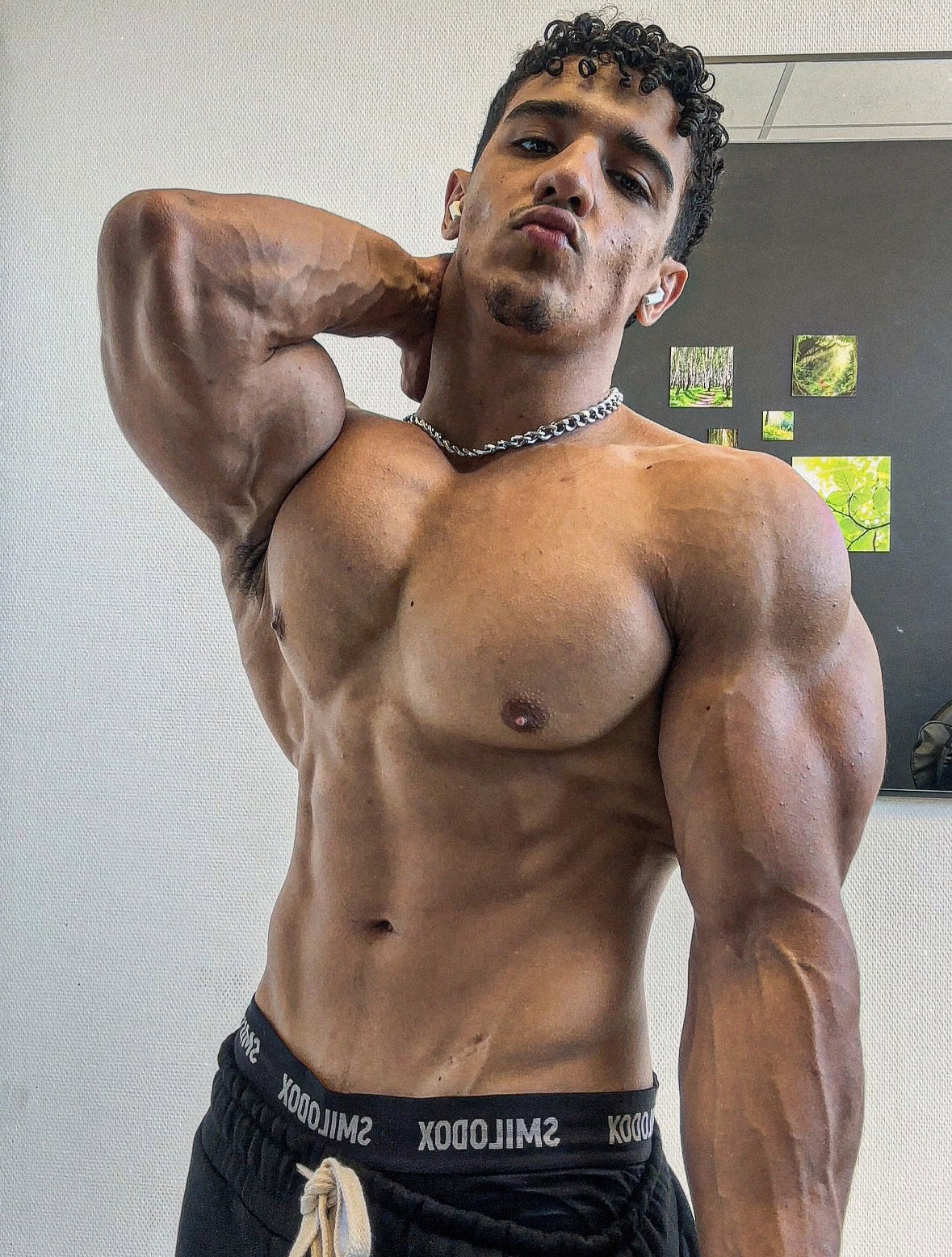 Goku, founder of GX1, showing his upper body