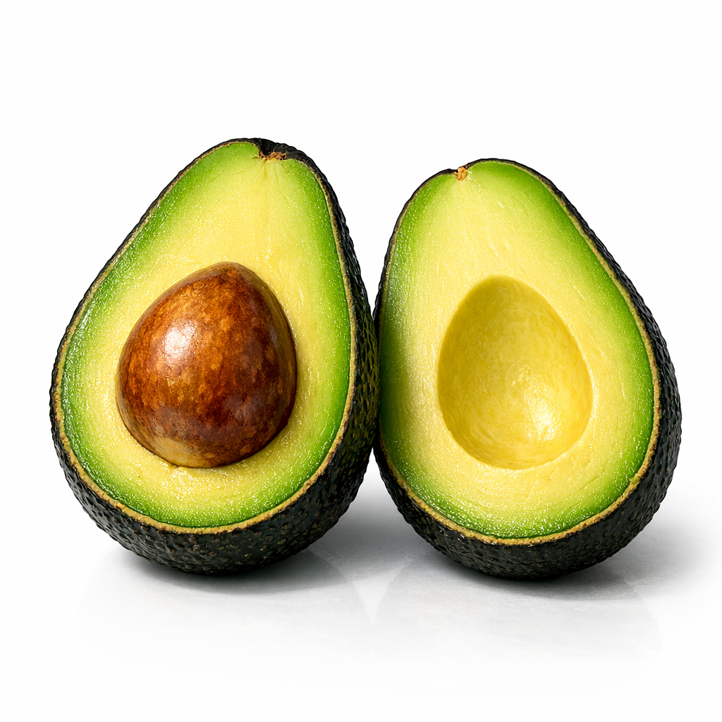 Two avocado halves, one with seed and one without, on a white background.
